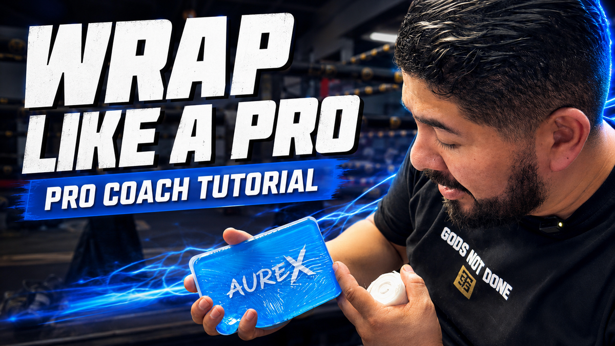 Load video: A professional boxing coach demonstrates step-by-step how to wrap a boxer’s hands using AUREX boxing gel pads and hand wraps for knuckle padding, wrist support, and protection during training.